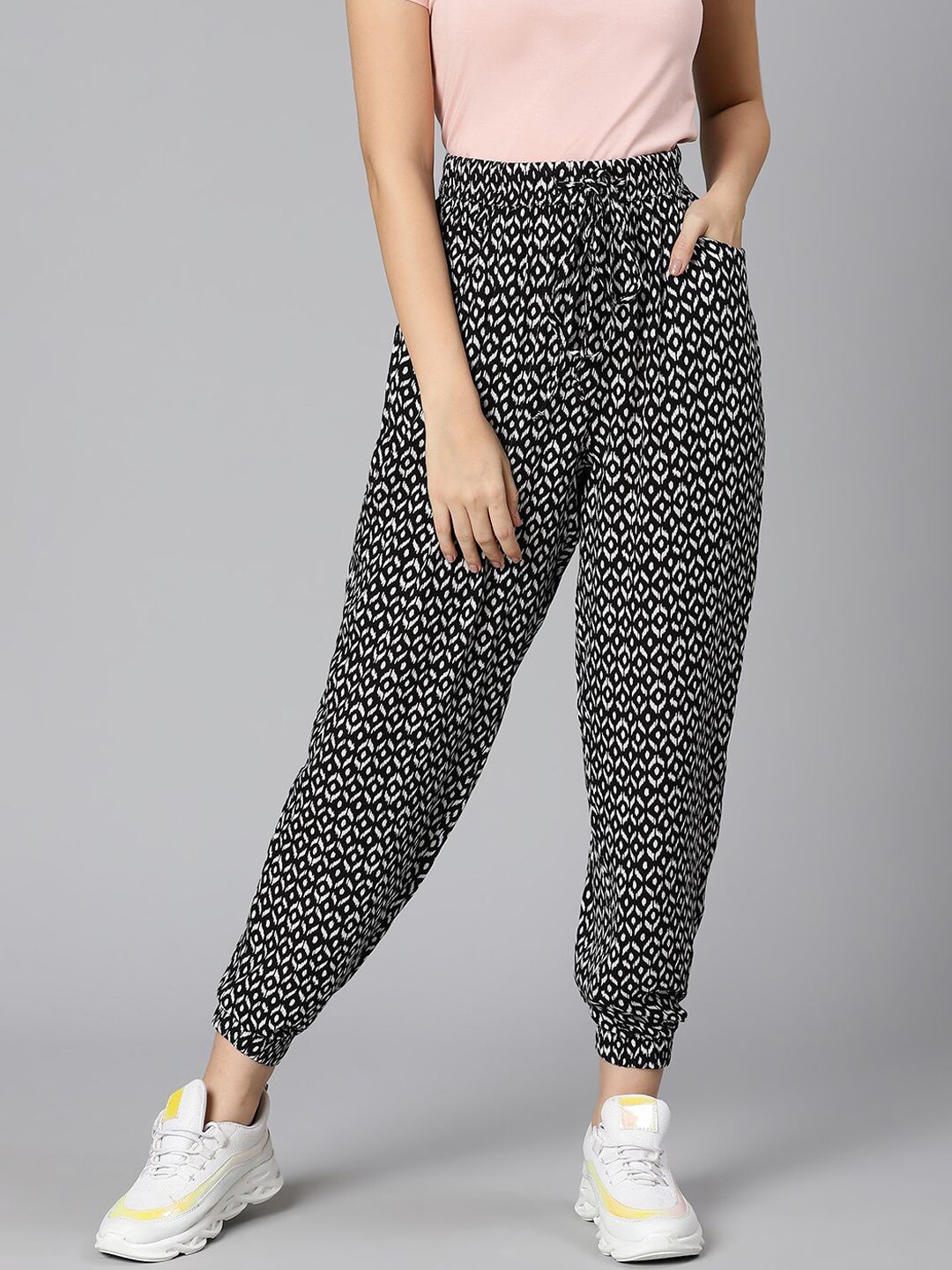 Oxolloxo Women Black Printed Joggers Trousers Price in India