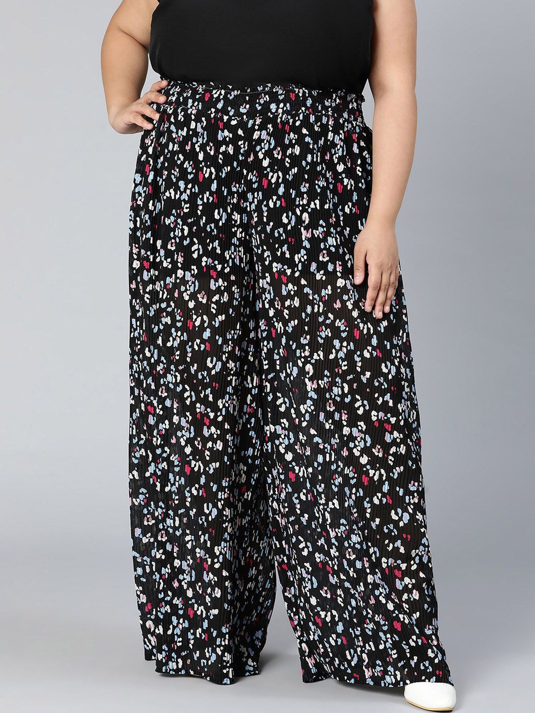 Oxolloxo Women Black Floral Printed Loose Fit Trousers Price in India