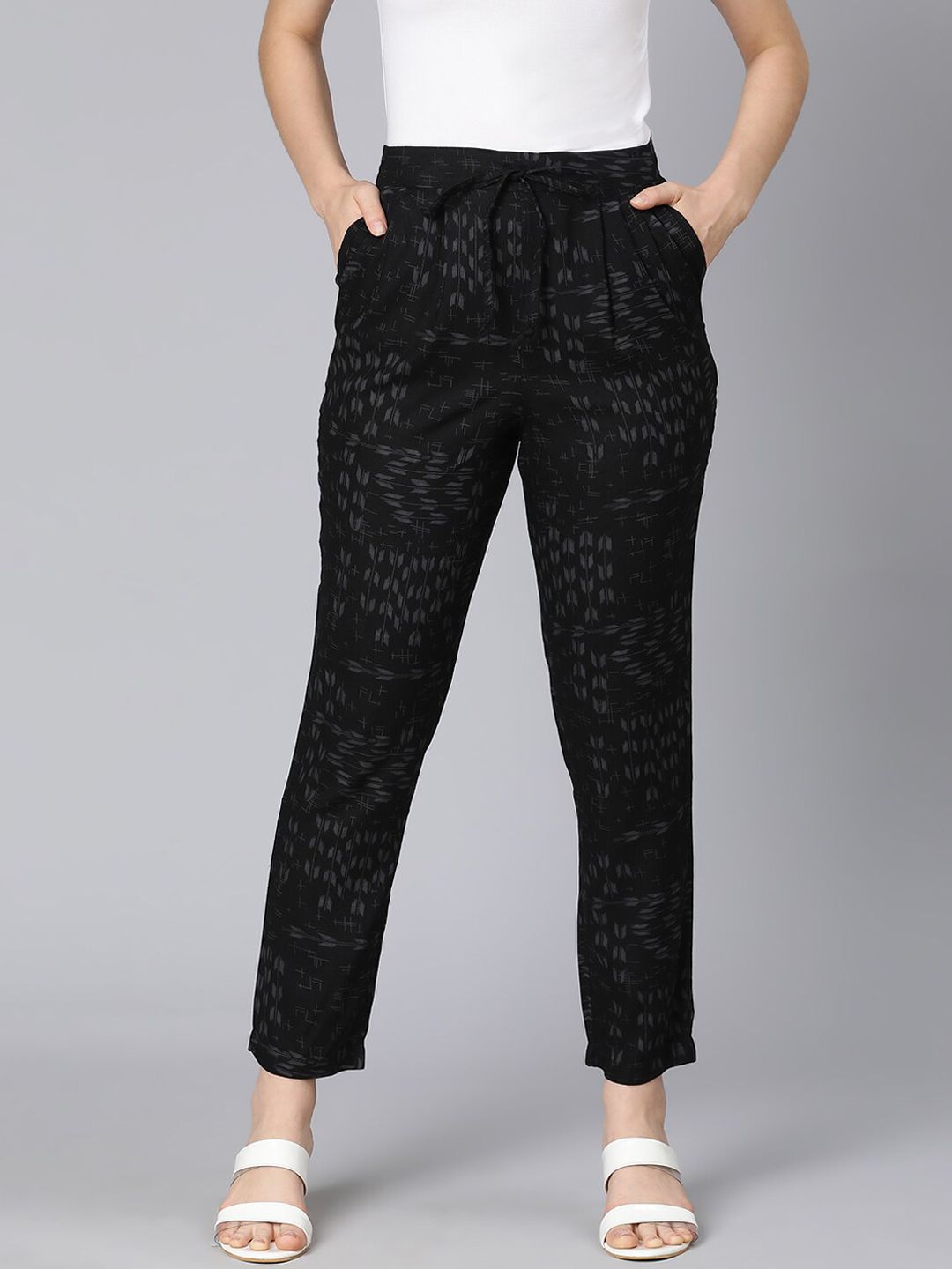 Oxolloxo Women Black Floral Printed Trousers Price in India