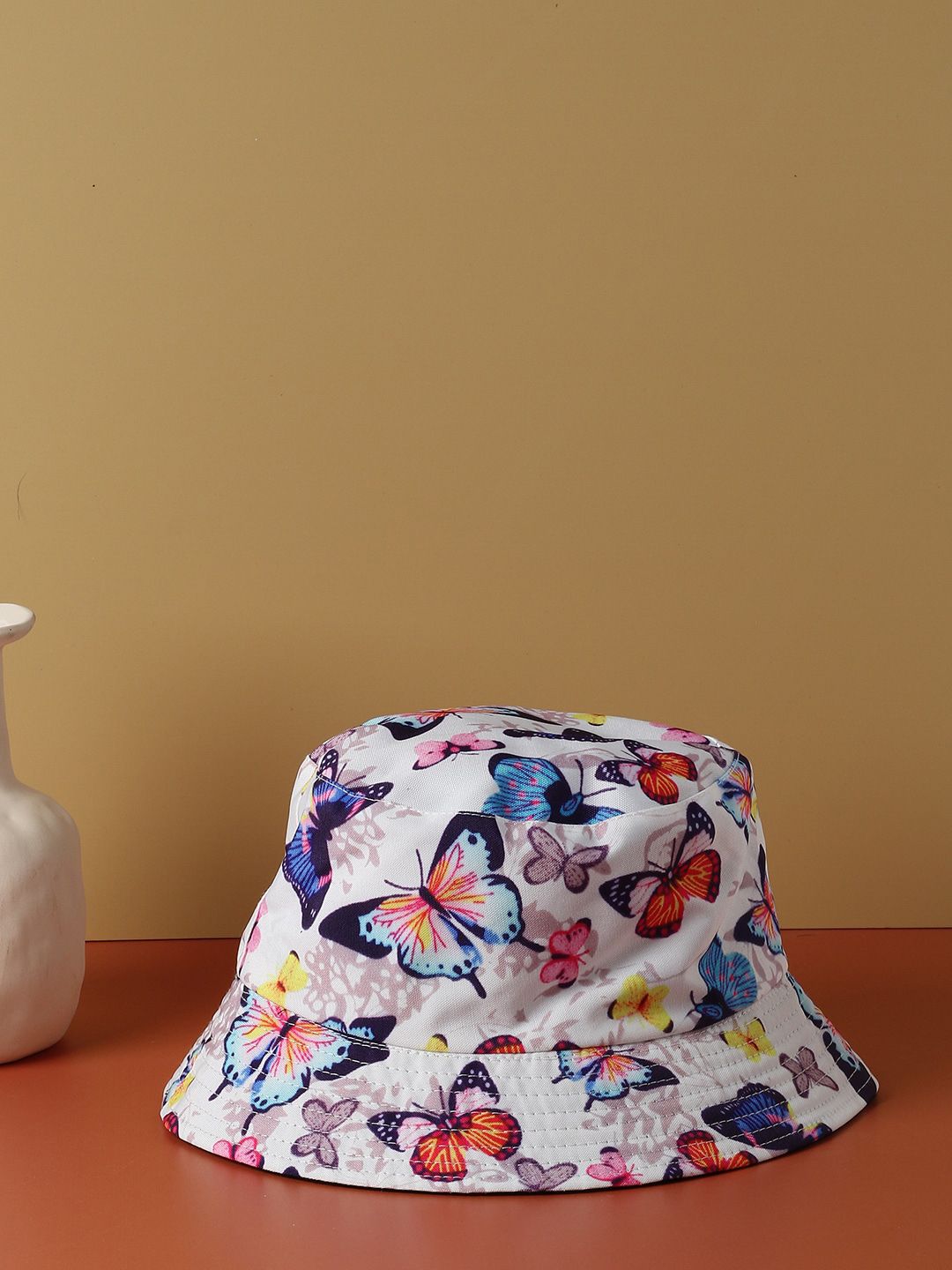 HAUTE SAUCE by Campus Sutra Women Purple & White Butterfly Printed Bucket Hat Price in India