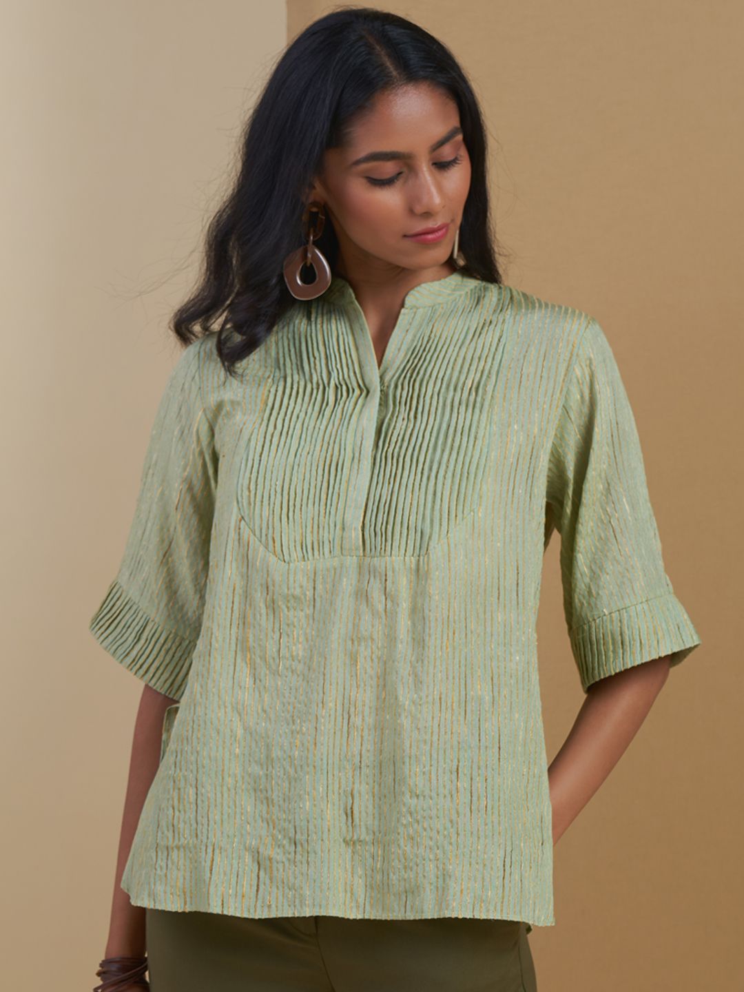 Ritu Kumar Green & Golden Striped Flared Sleeves Pure Cotton Pleated Kurti Price in India