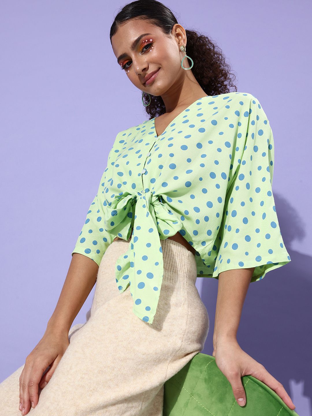 People Striking Green Polka Dotted Twist & Knot Top Price in India