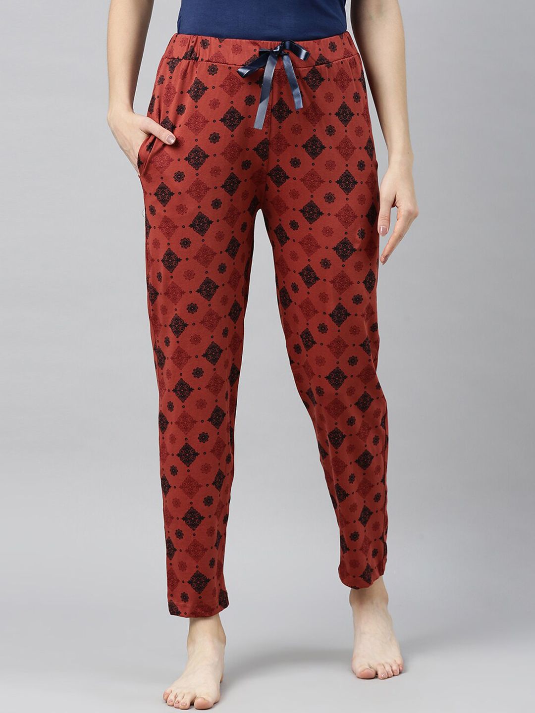 Enviously Young Women Rust Printed Cotton Lounge Pants Price in India