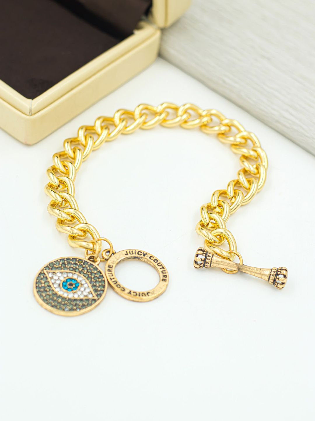 Bellofox Women Gold-Plated Stone Studded Link Bracelet Price in India