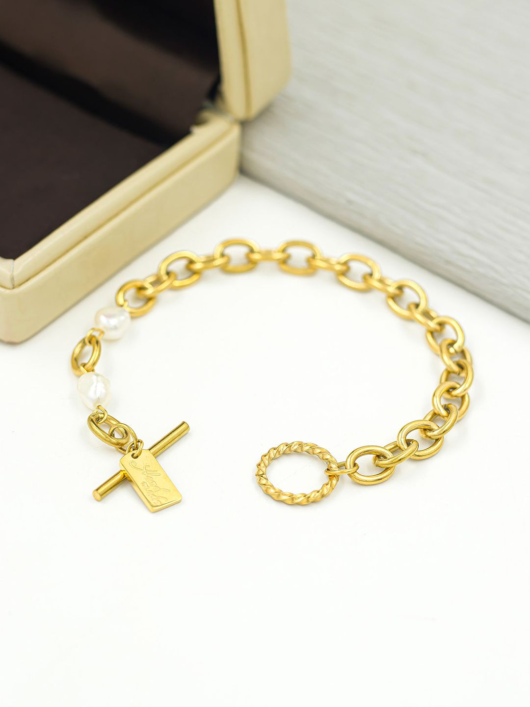 Bellofox Women Gold-Toned & White Pearls Link Interlock Bracelet Price in India