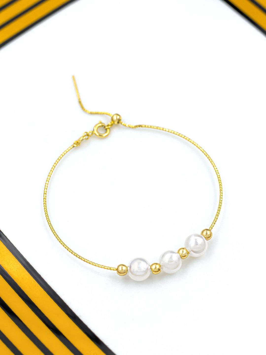 Bellofox Women Gold-Toned & White Pearls Link Bracelet Price in India