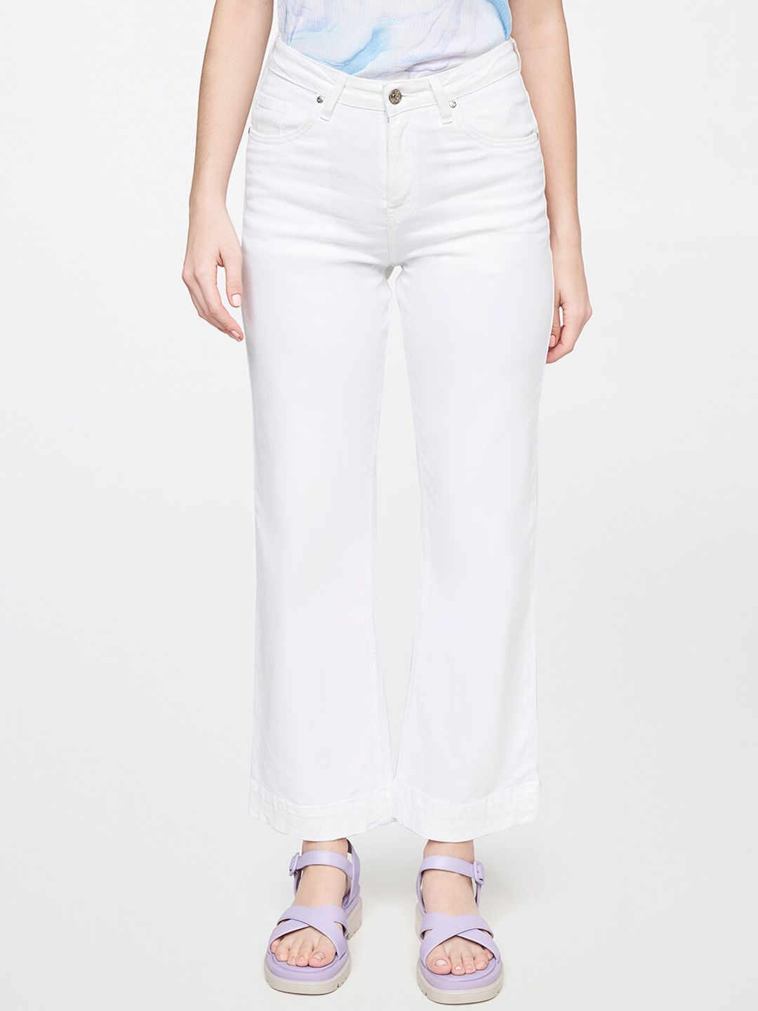 AND Women White Solid Flared Trousers Price in India