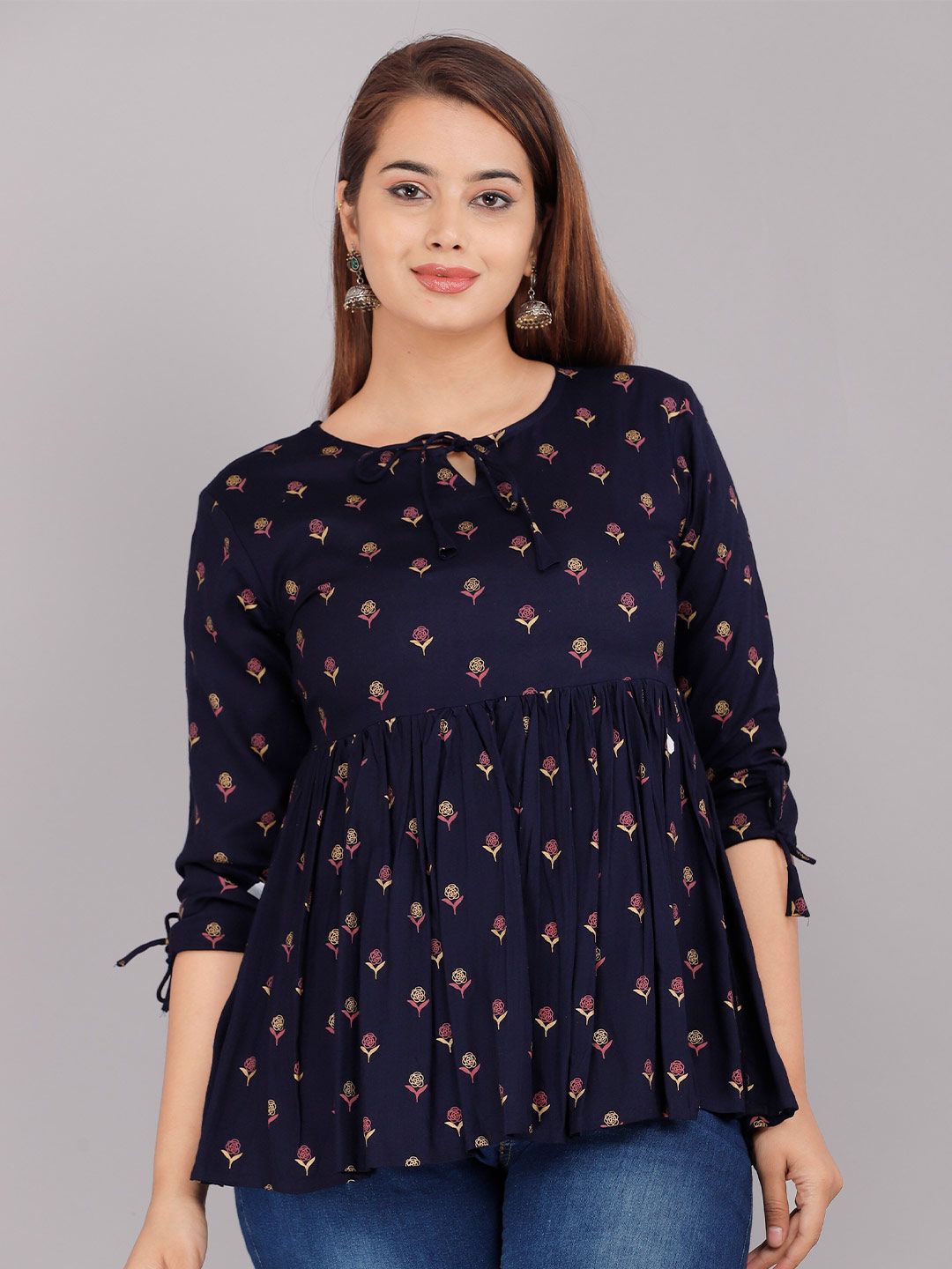 KALINI Navy Blue Geometric Print Tie-Up Neck Empire Top Price in India