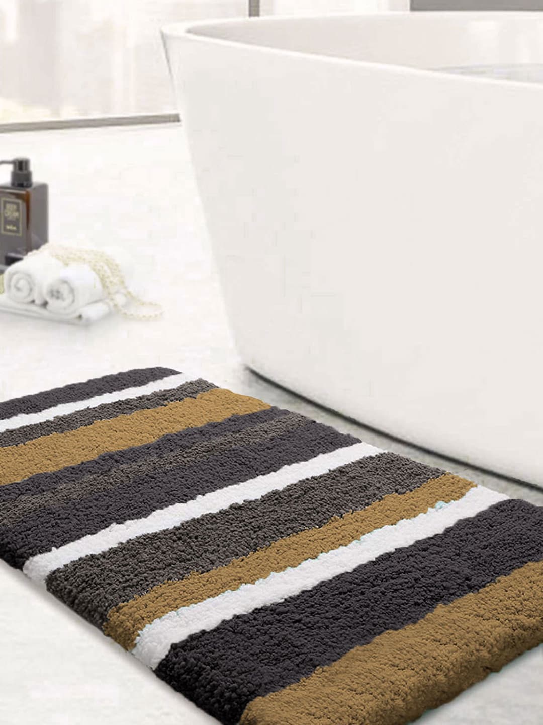 LUXEHOME INTERNATIONAL Gold-Toned Striped 2400 GSM Bath Rugs Price in India