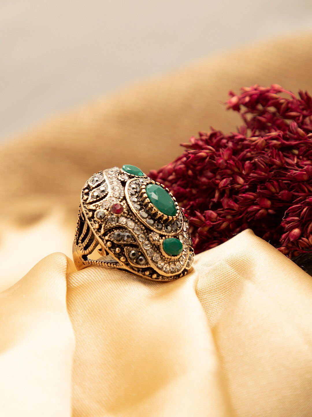 SOHI Women Gold-Plated Green Stone Studded Designer Finger Ring Price in India