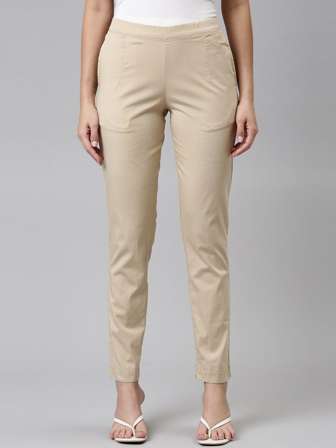 Go Colors Women Beige Tapered Fit Trousers Price in India