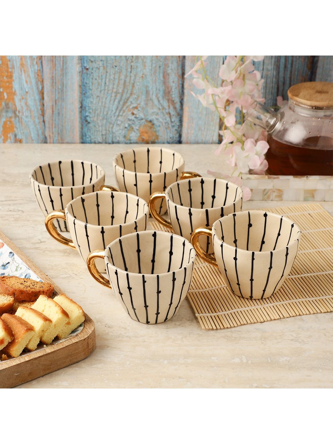 The Decor Mart Beige & Black Printed Ceramic Glossy Mugs Set of Cups and Mugs Price in India