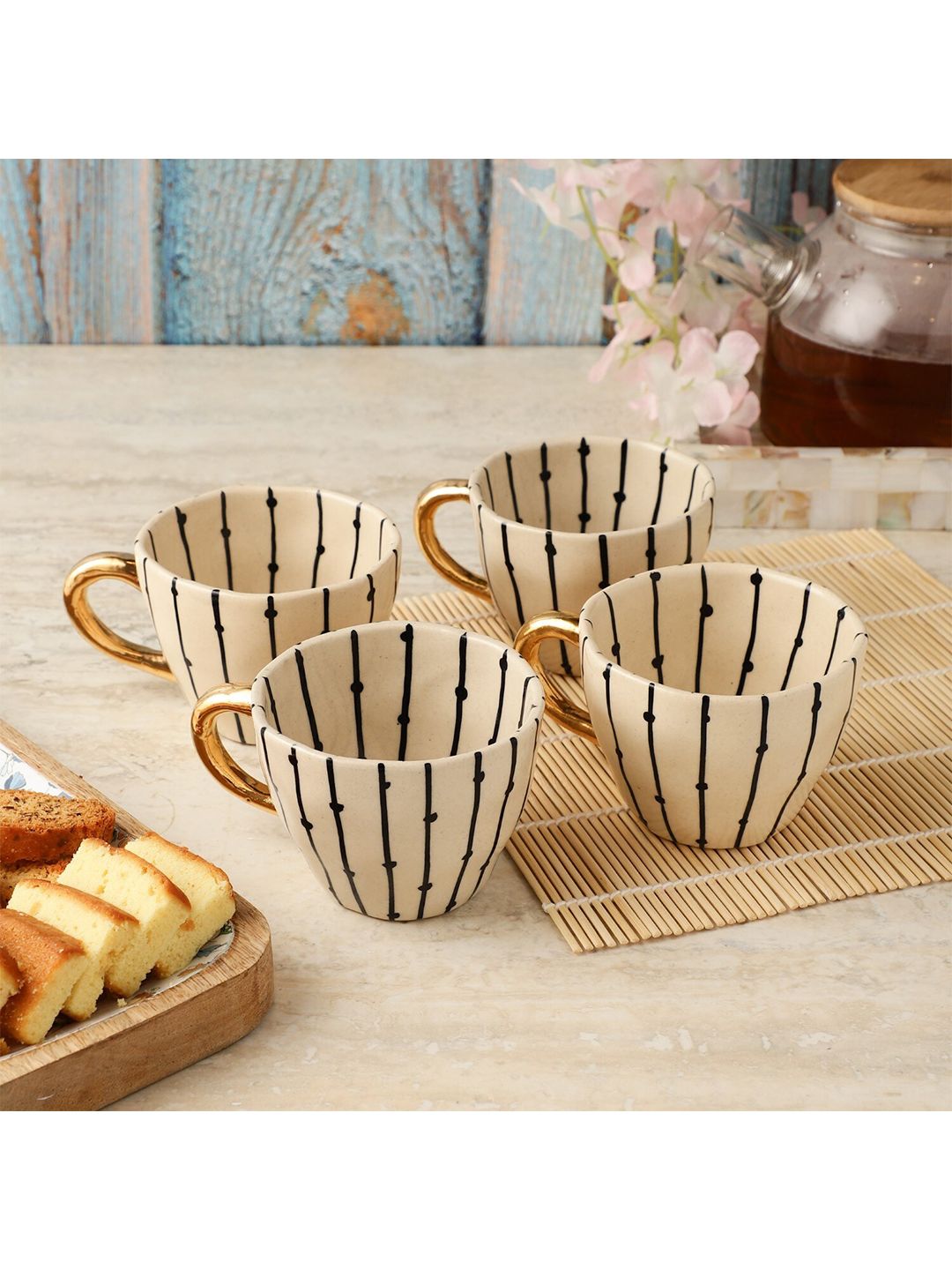 The Decor Mart Cream-Coloured & Black Printed Ceramic Glossy Mugs Set of Cups and Mugs Price in India