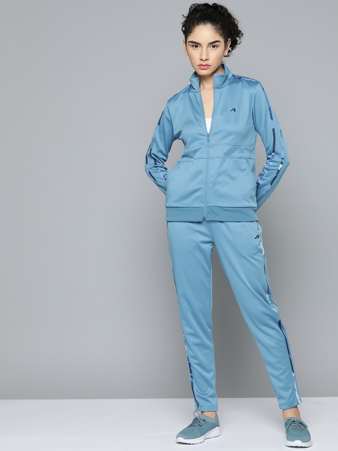 Alcis Women Solid Tracksuit Price in India