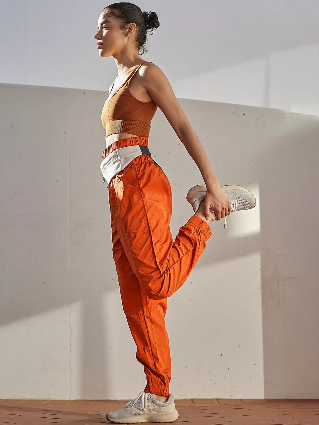 BoStreet Women Orange Tapered Fit Joggers Trousers Price in India
