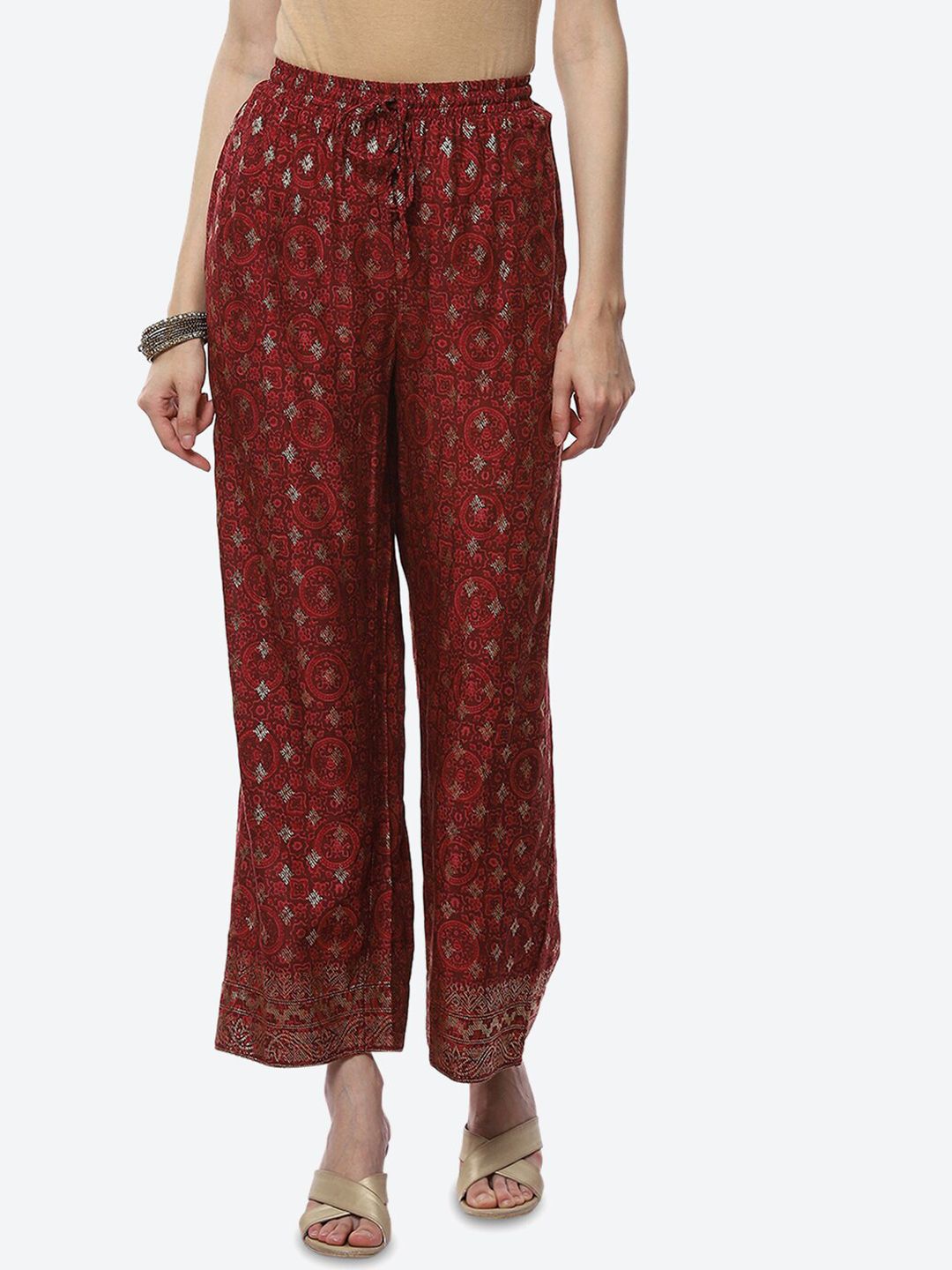 Biba Women Rust Ethnic Motifs Printed Loose Fit Easy Wash Trousers Price in India