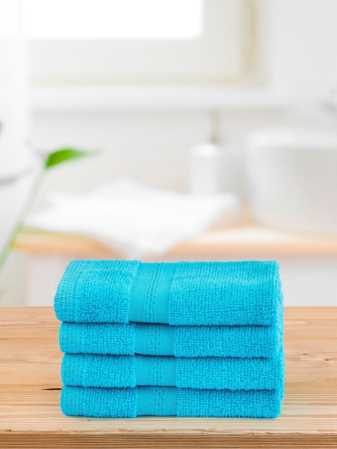 Layers Turquoise Blue Set of 4 400 GSM Zero Twist Face Towels Price in India