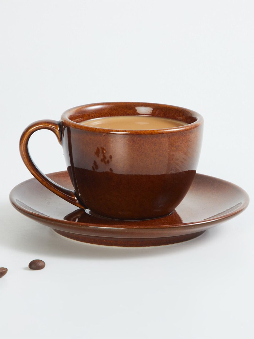 Home Centre Brown Textured Stoneware Glossy Cup and Saucer Price in India