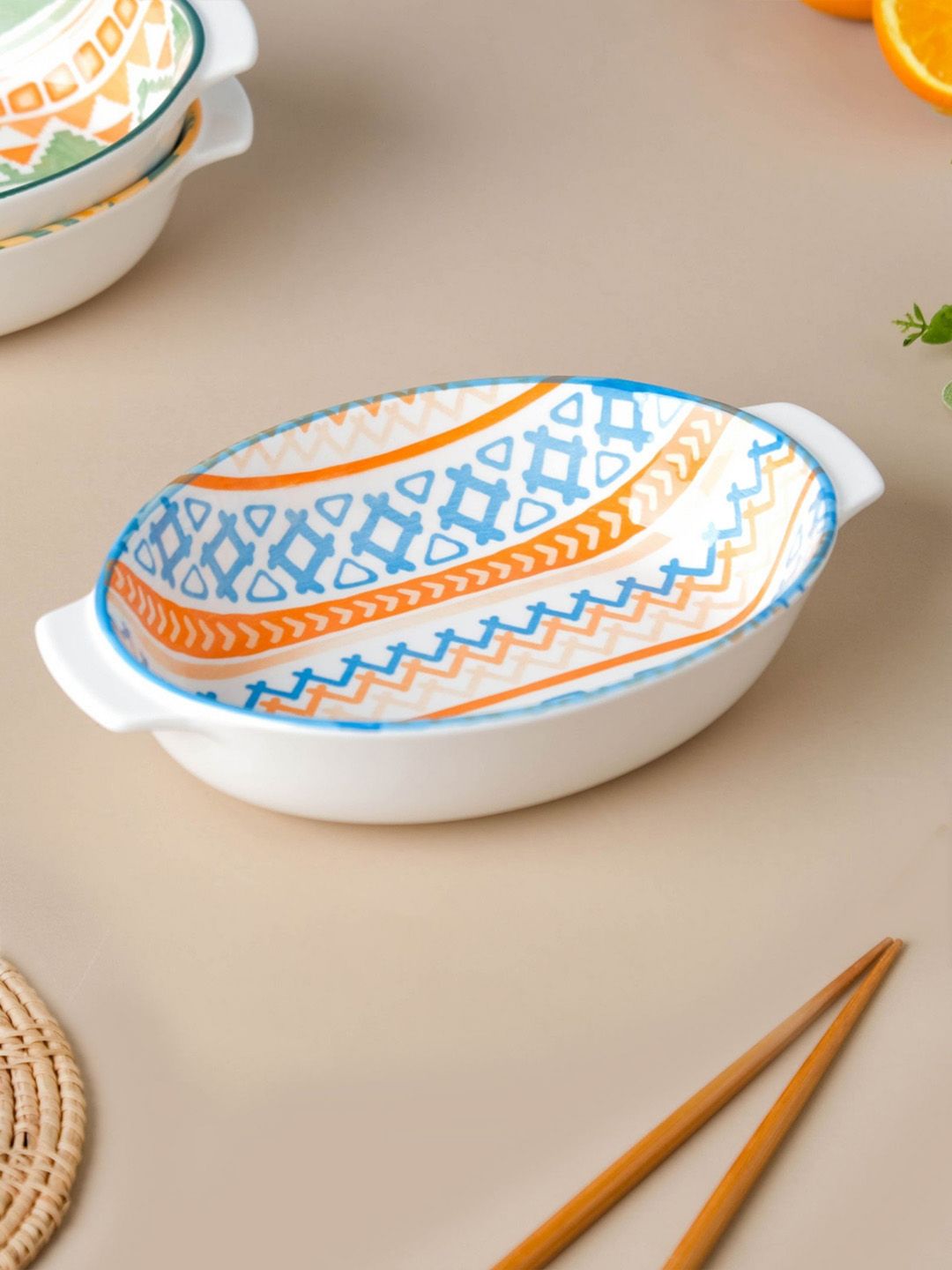 Nestasia White & Orange Printed Ceramic Baking Dish With Handle 9 Inch Price in India