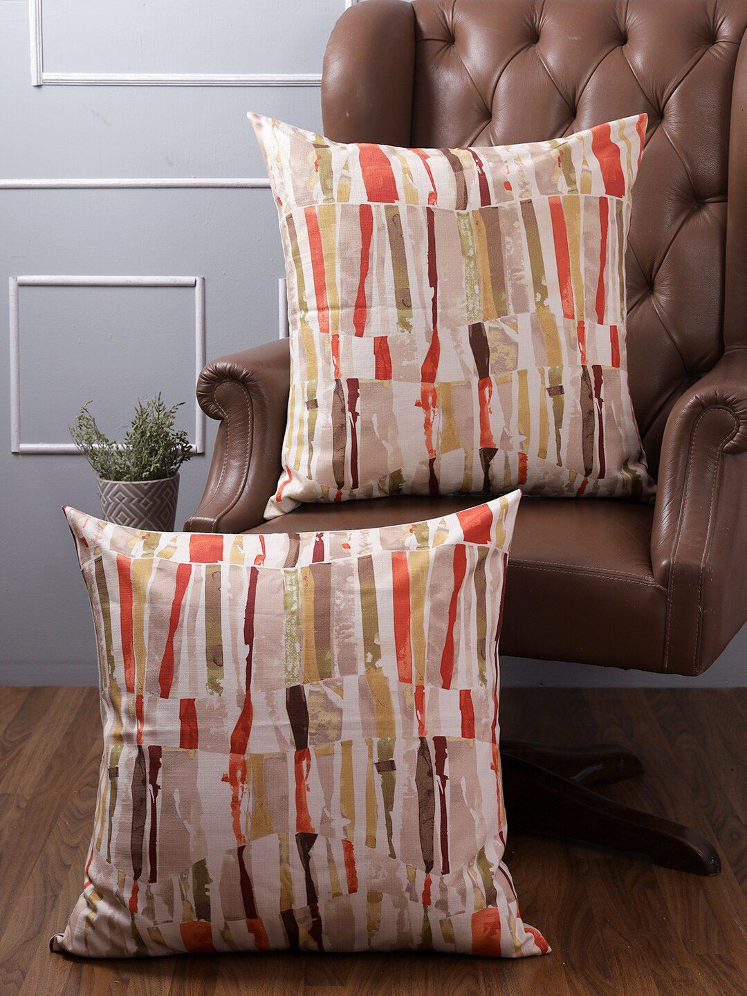 KRAVIKA Orange & White Set of 2 Geometric Square Cushion Covers Price in India