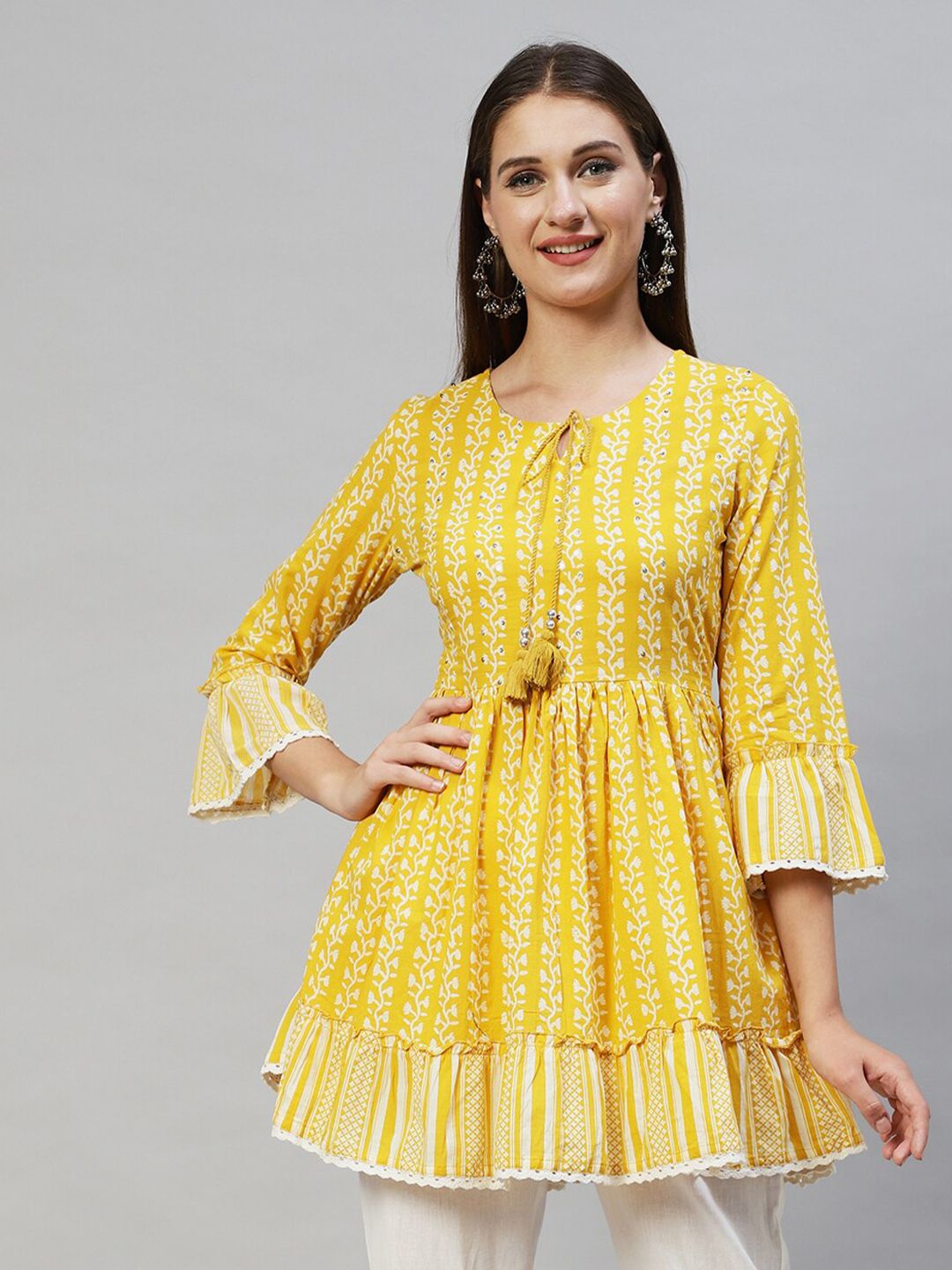 FASHOR Women Yellow & White Floral Printed Sequinned Pure Cotton Kurti Price in India