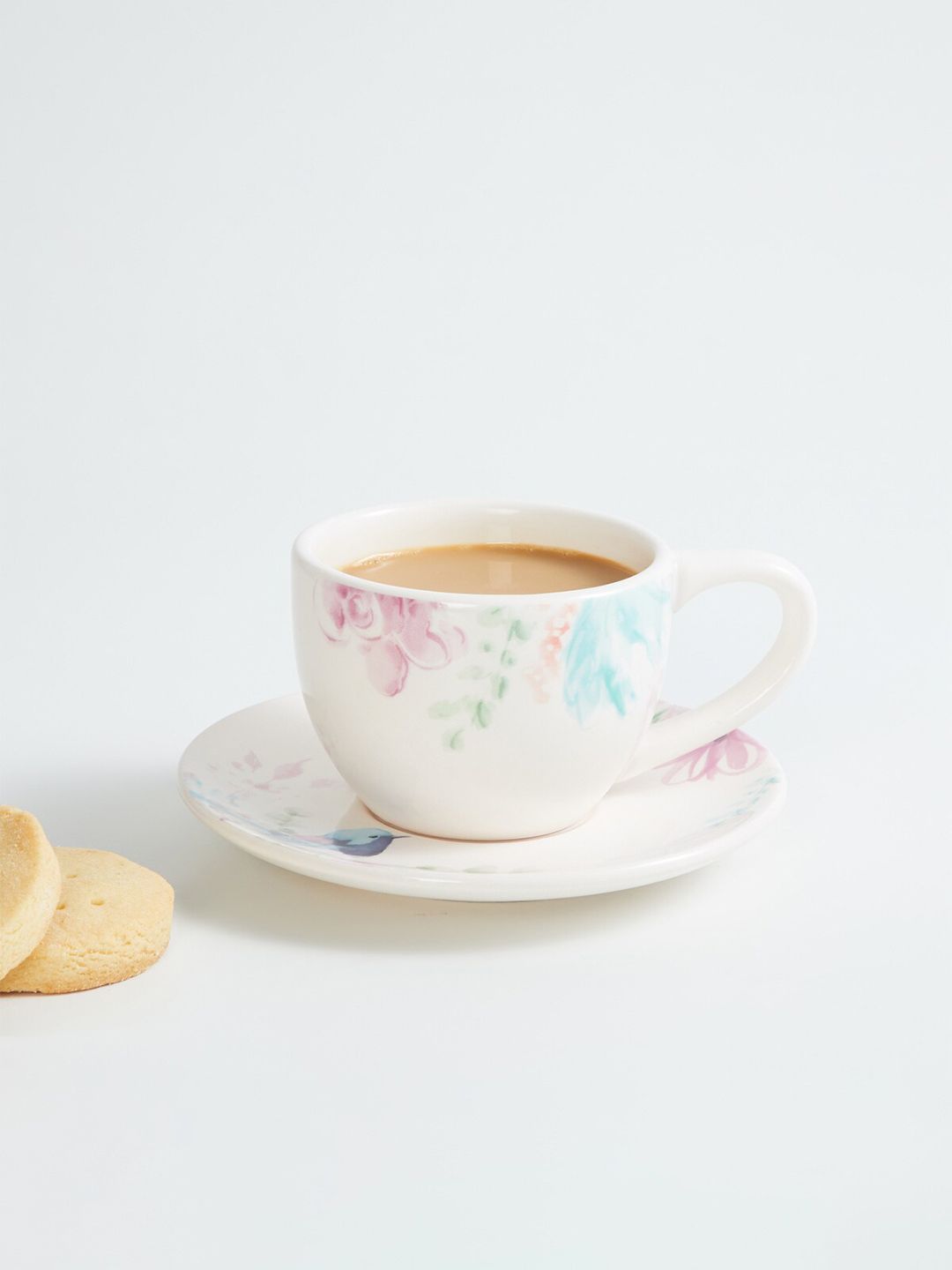 Home Centre White & Pink Printed Stoneware Glossy Cup And Saucer Price in India