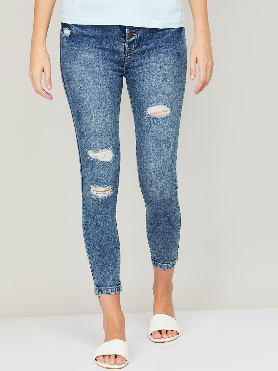 Ginger by Lifestyle Women Blue Mildly Distressed Light Fade Jeans Price in India
