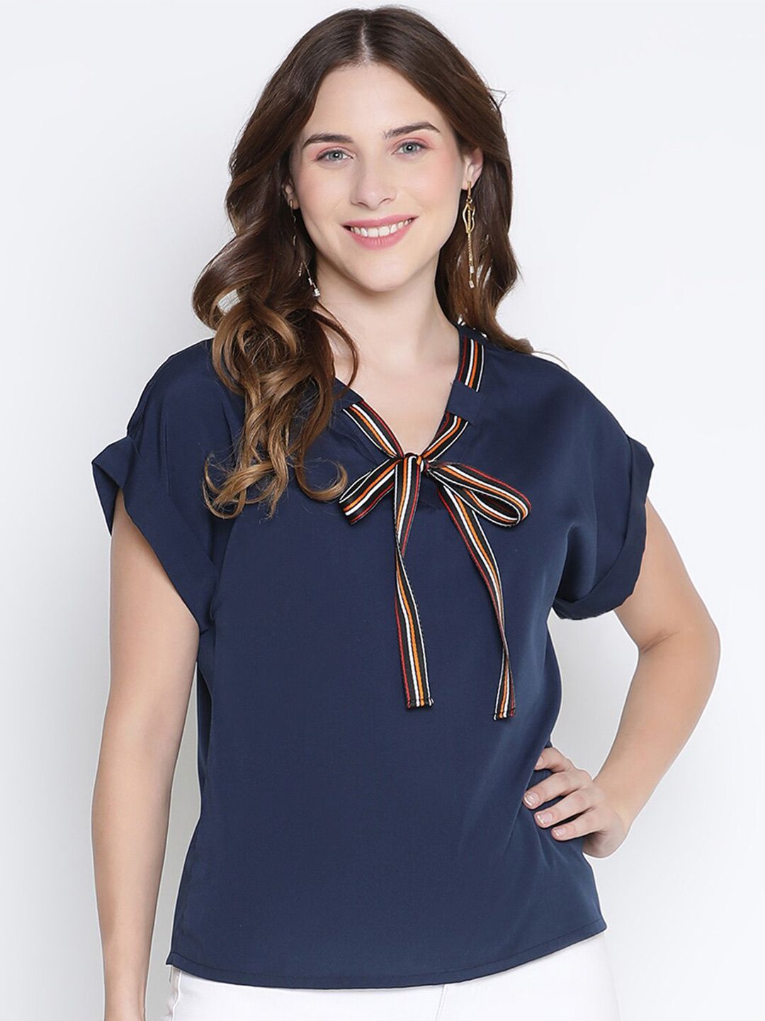 DRAAX Fashions Blue Tie-Up Neck Extended Sleeves Top Price in India