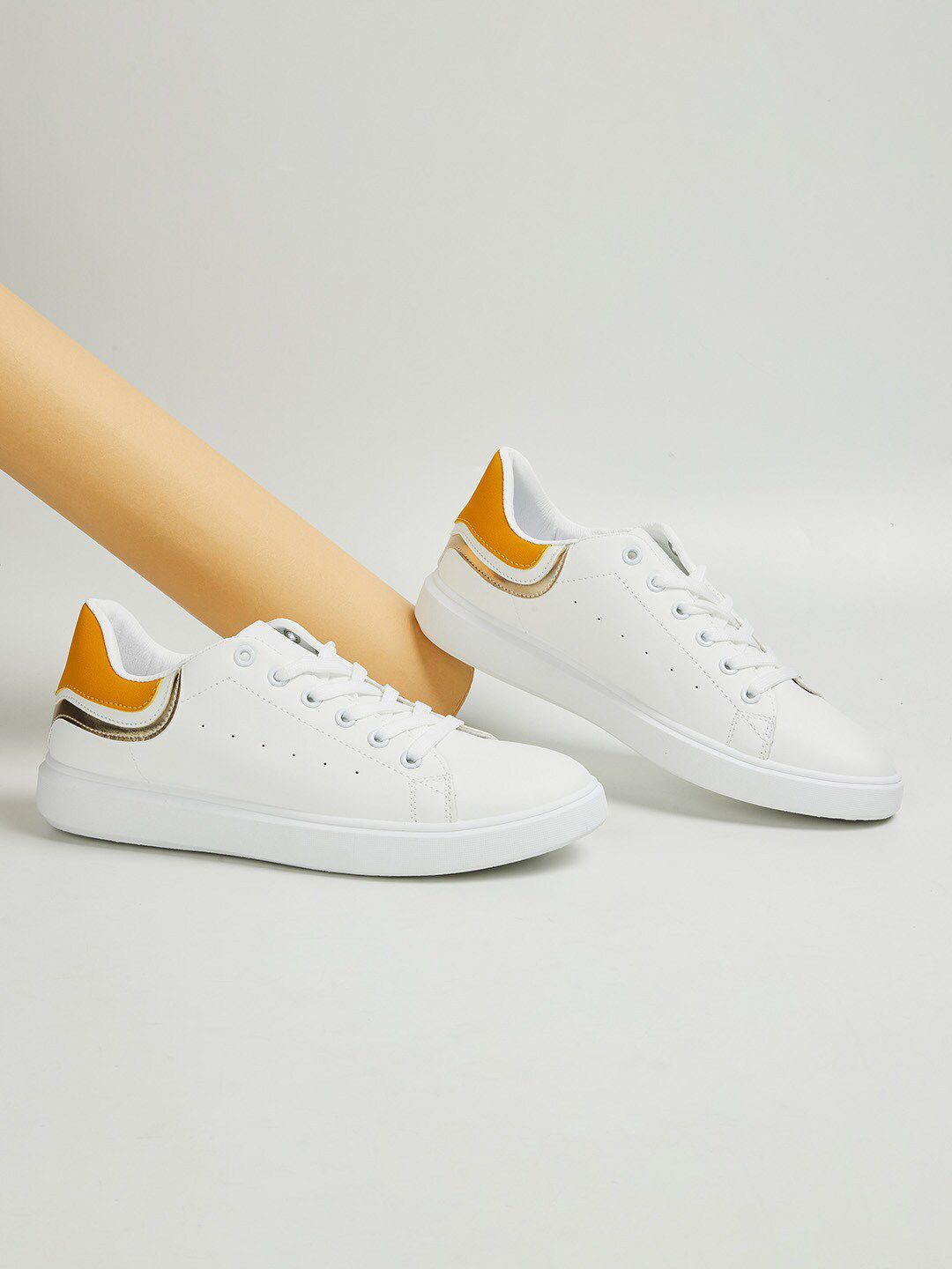 Ginger by Lifestyle Women Yellow Perforations PU Sneakers Price in India