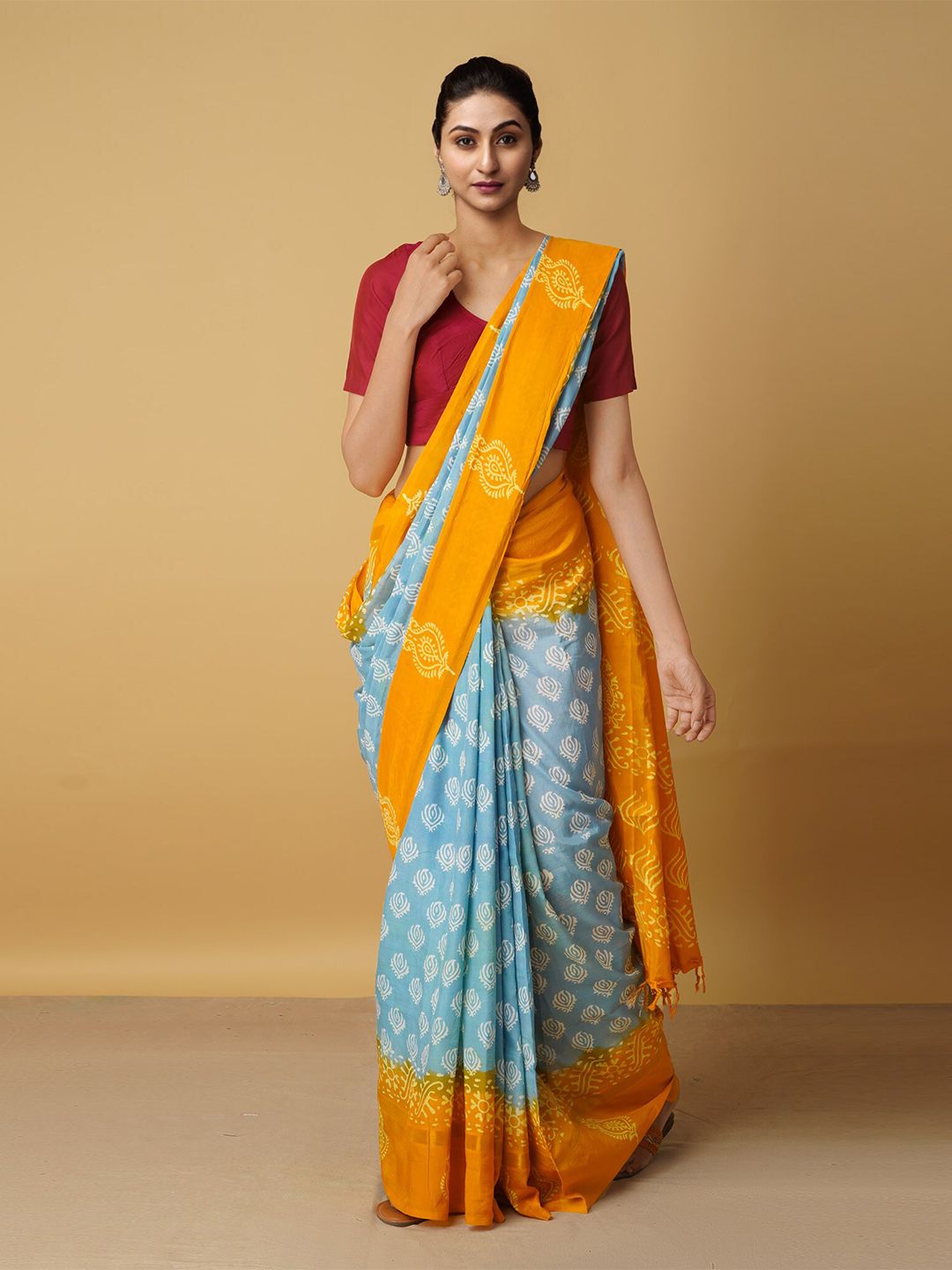 Unnati Women Silks Blue & Orange Ethnic Motifs Zari Silk Blend Baluchari Saree Price in India