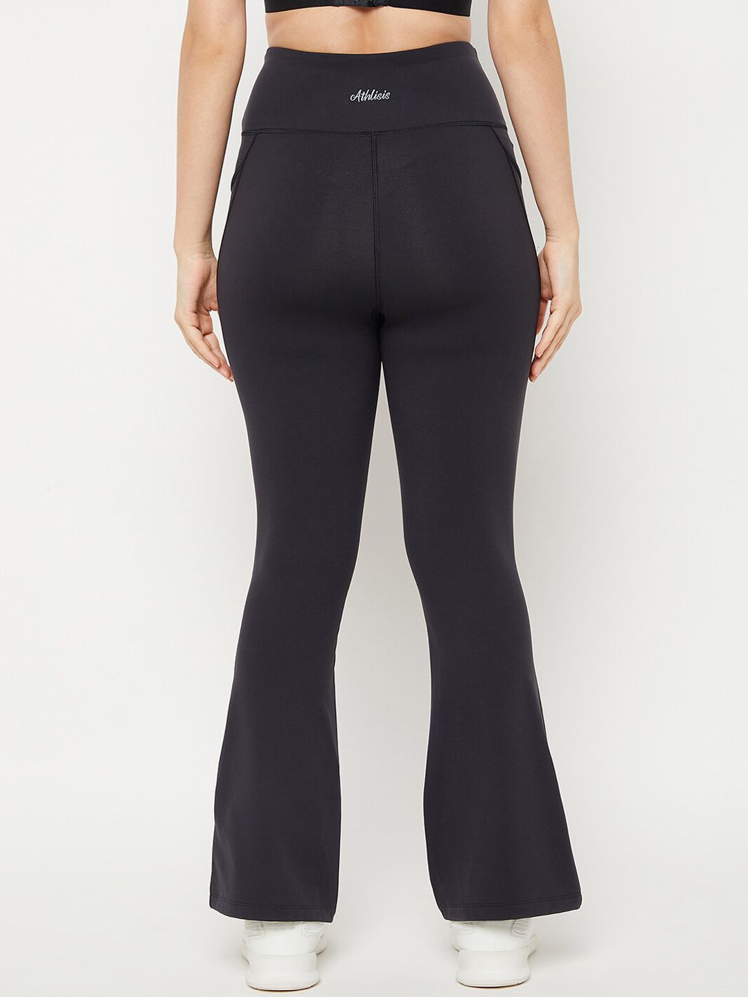 Buy ATHLISIS Women Black Solid Flared Track Pants - Track Pants