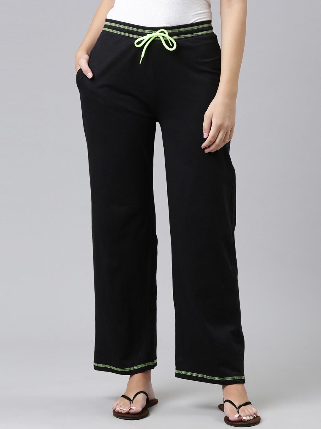 Kryptic Women Black Solid Cotton Parallel Fit Lounge Pants Price in India