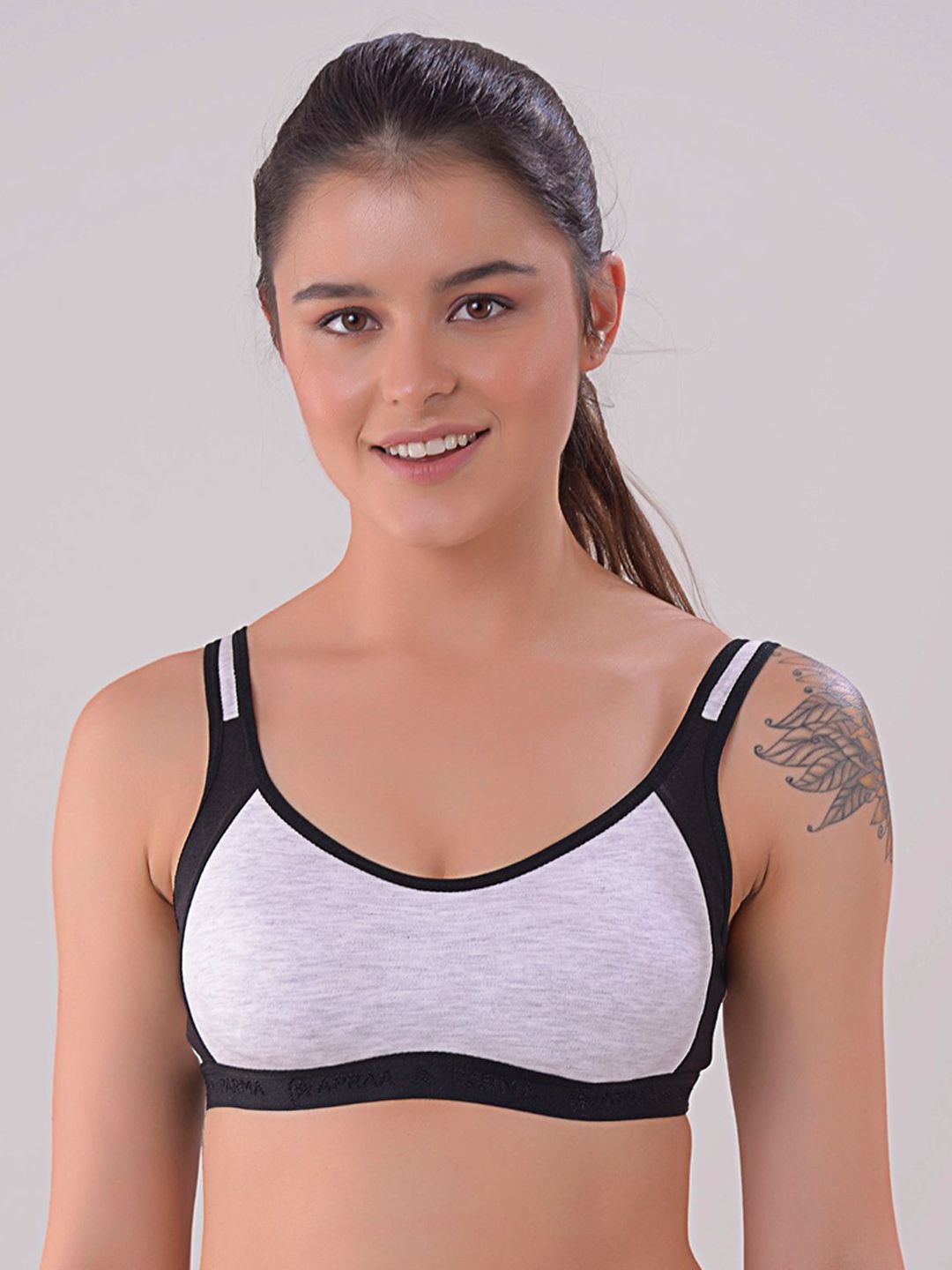 Apraa & Parma Black & White Solid Non-Wired Non Padded Sports Bra Price in India