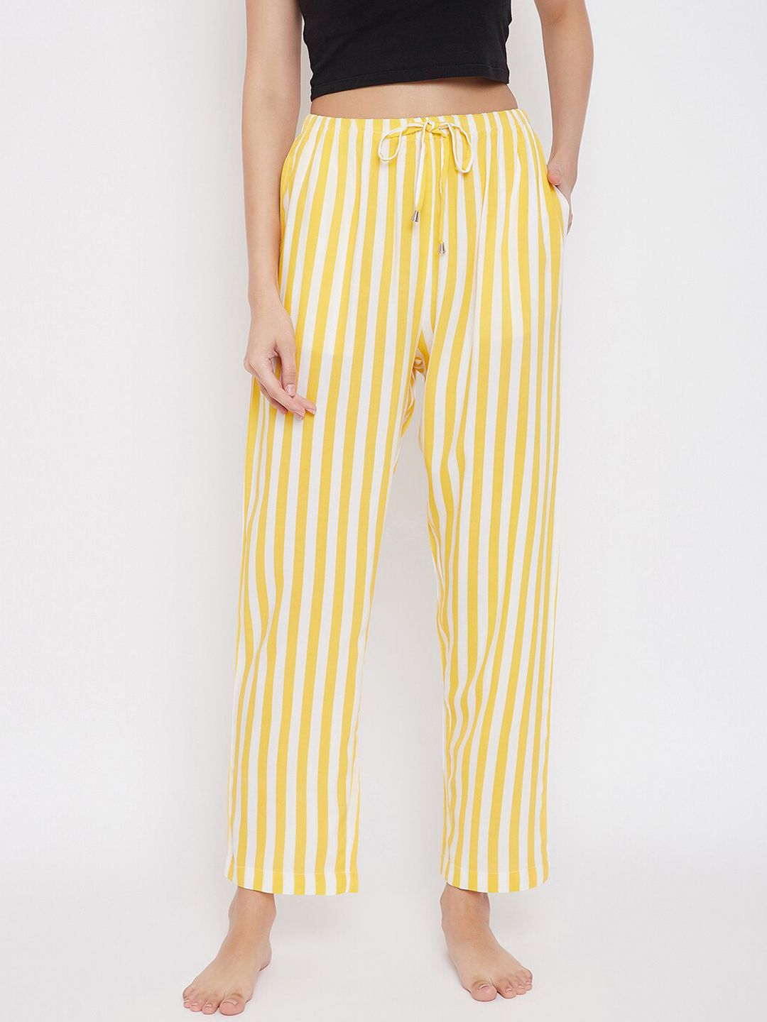 Hypernation Women Yellow & White Striped Lounge Pants Price in India