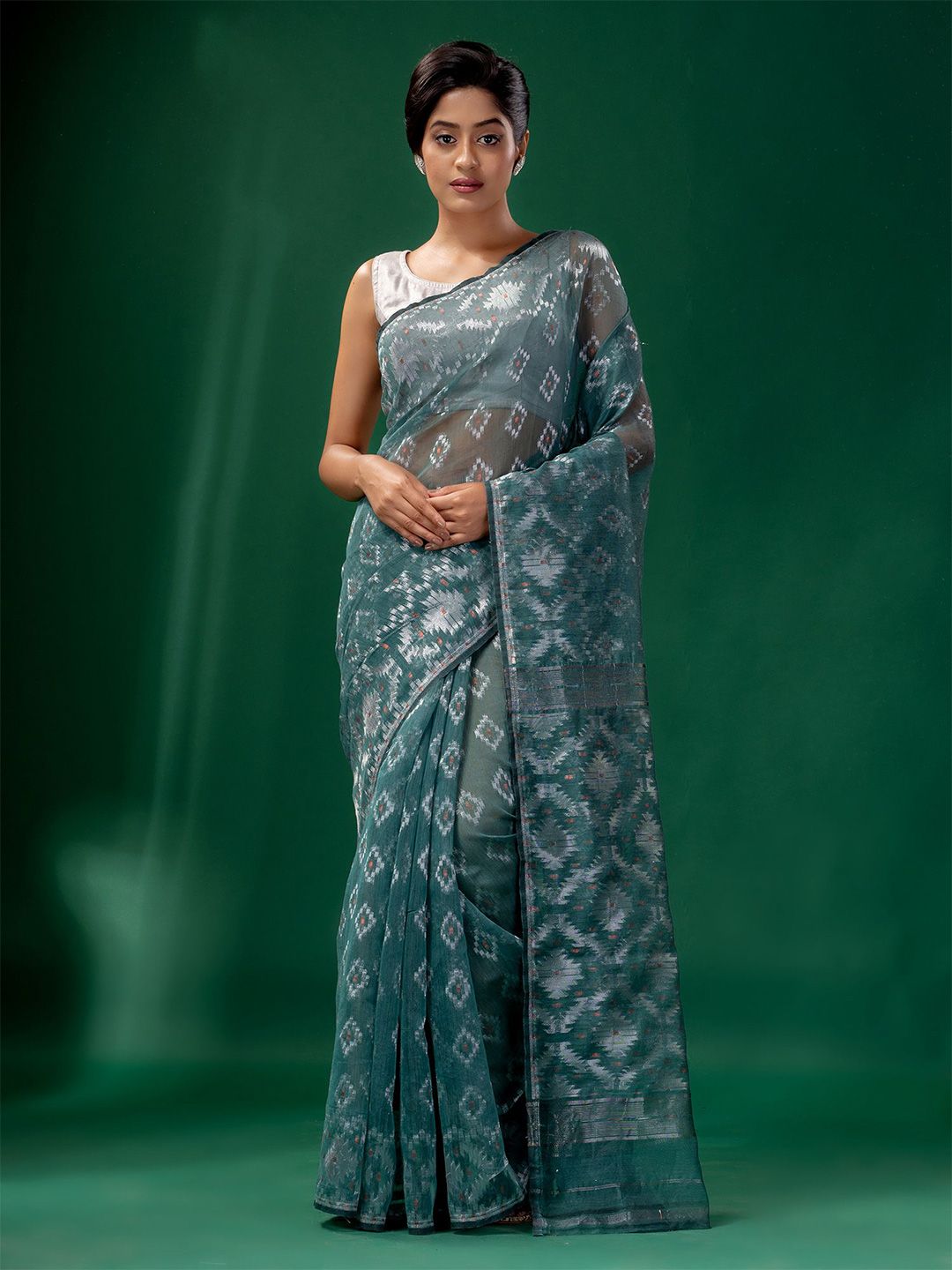 Charukriti Teal & Silver-Toned Floral Zari Silk Cotton Jamdani Saree Price in India