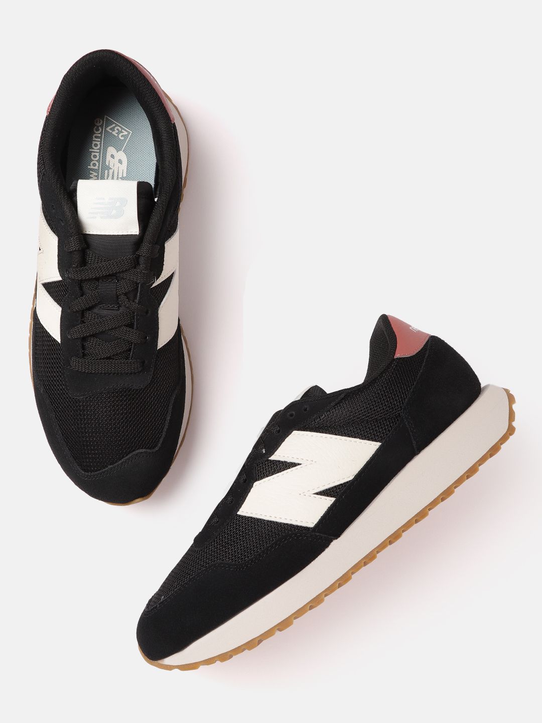 New Balance Women Black Solid Sneakers Price in India