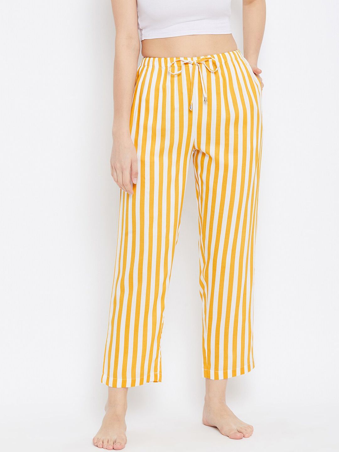 Hypernation Women Yellow & White Striped Cotton Lounge Pants Price in India