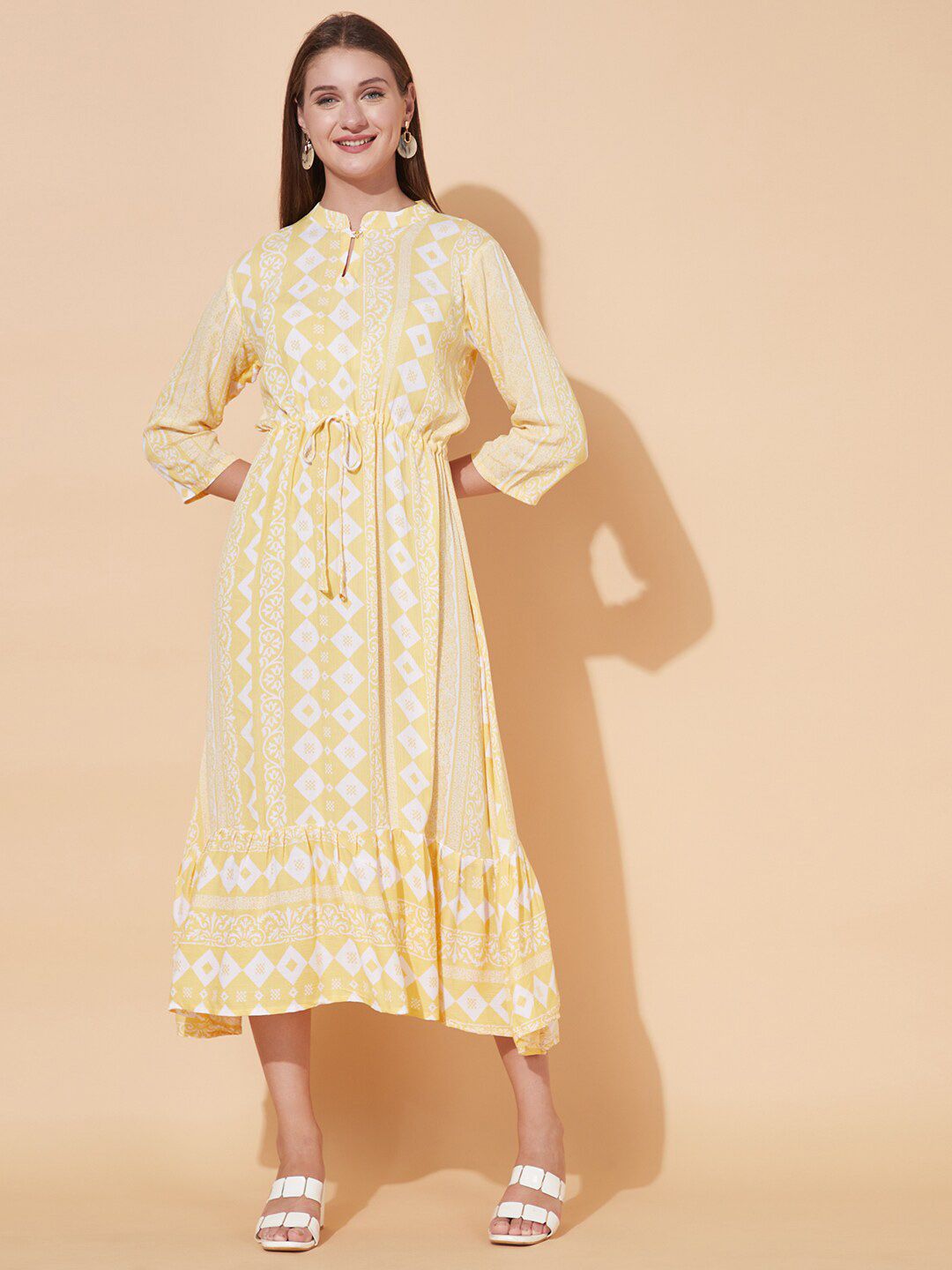 FASHOR Women Yellow Printed Cotton Crepe A-Line Dress Price in India