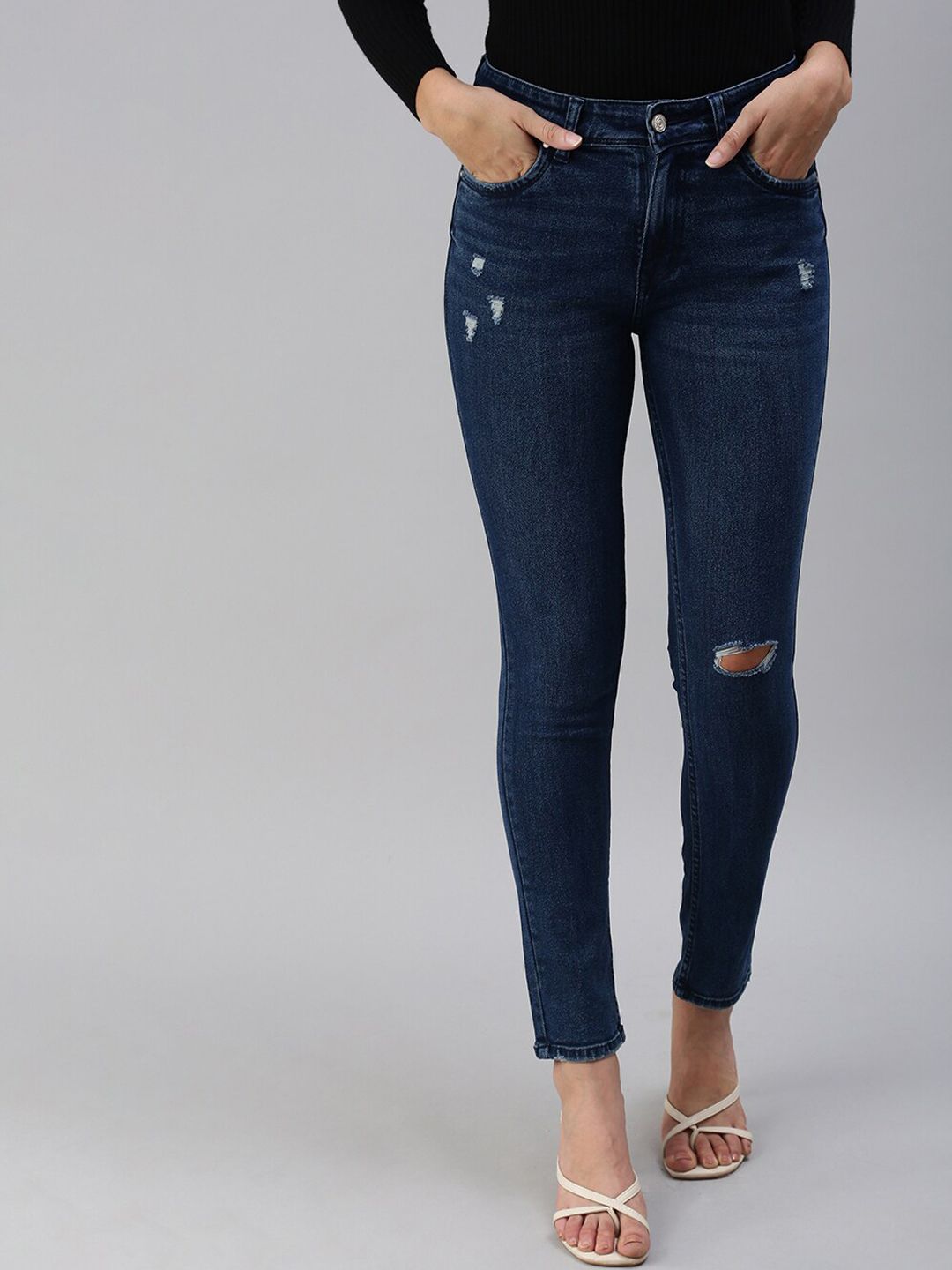 SHOWOFF Women Blue Slim Fit High-Rise Slash Knee Stretchable Jeans Price in India