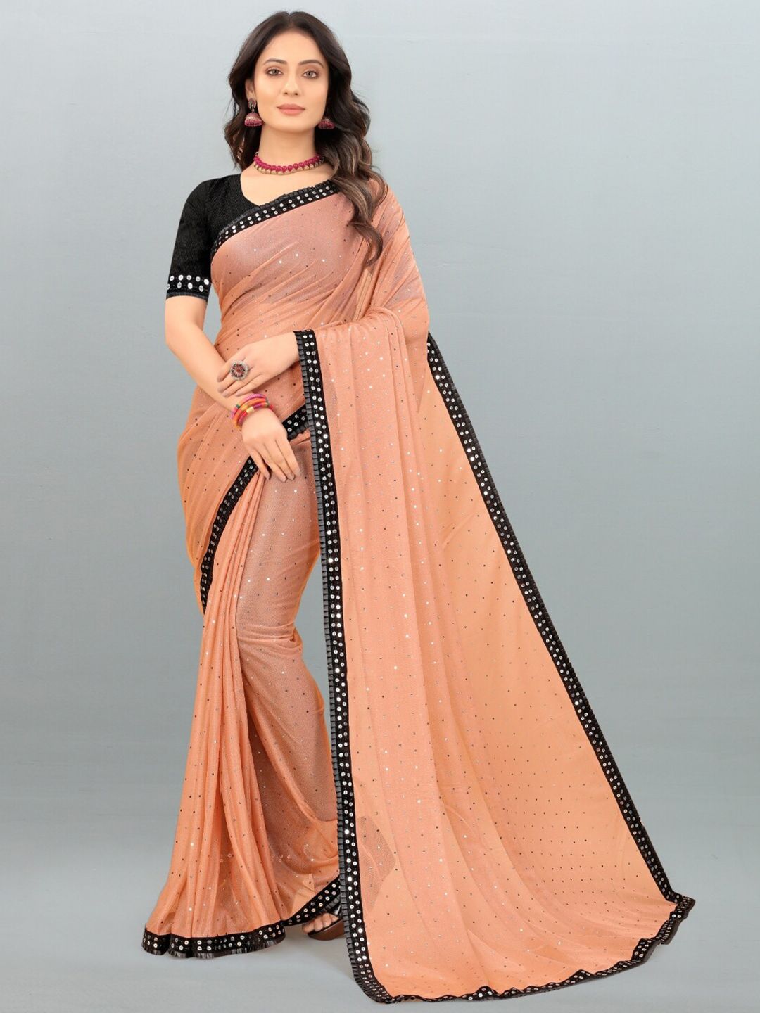APNISHA Peach-Coloured & Black Embellished Saree Price in India
