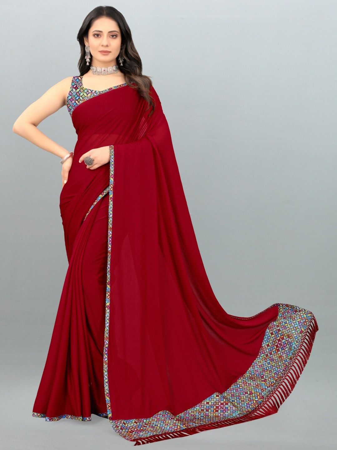 APNISHA Red & Blue Solid Saree Price in India