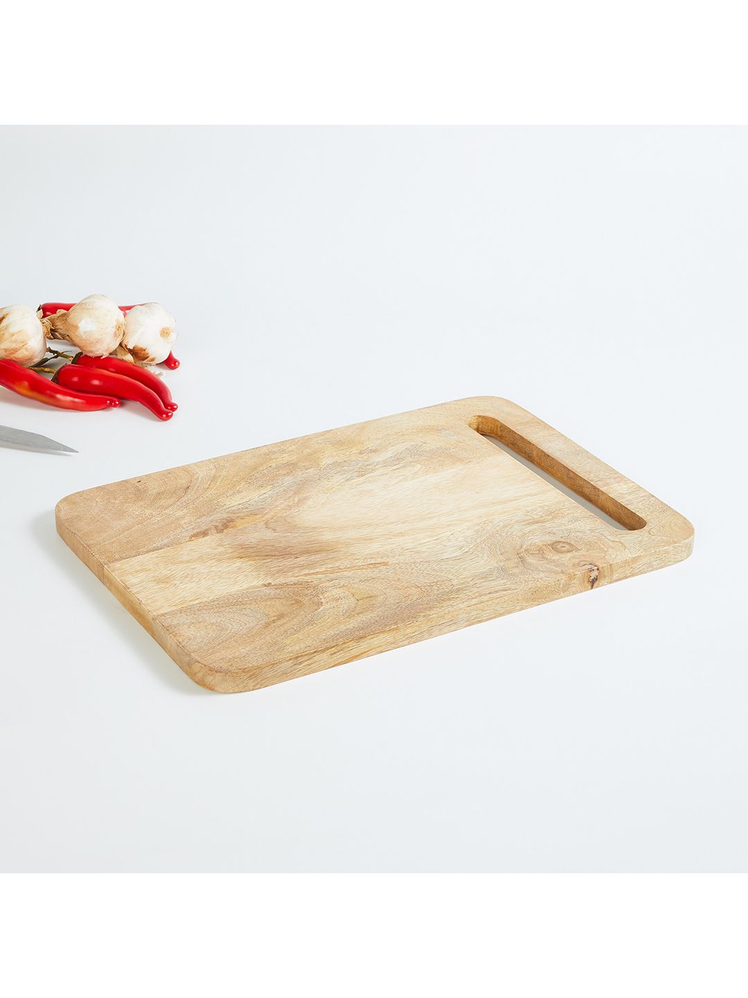 Home Centre Beige Solid Wooden Chopping Board Price in India