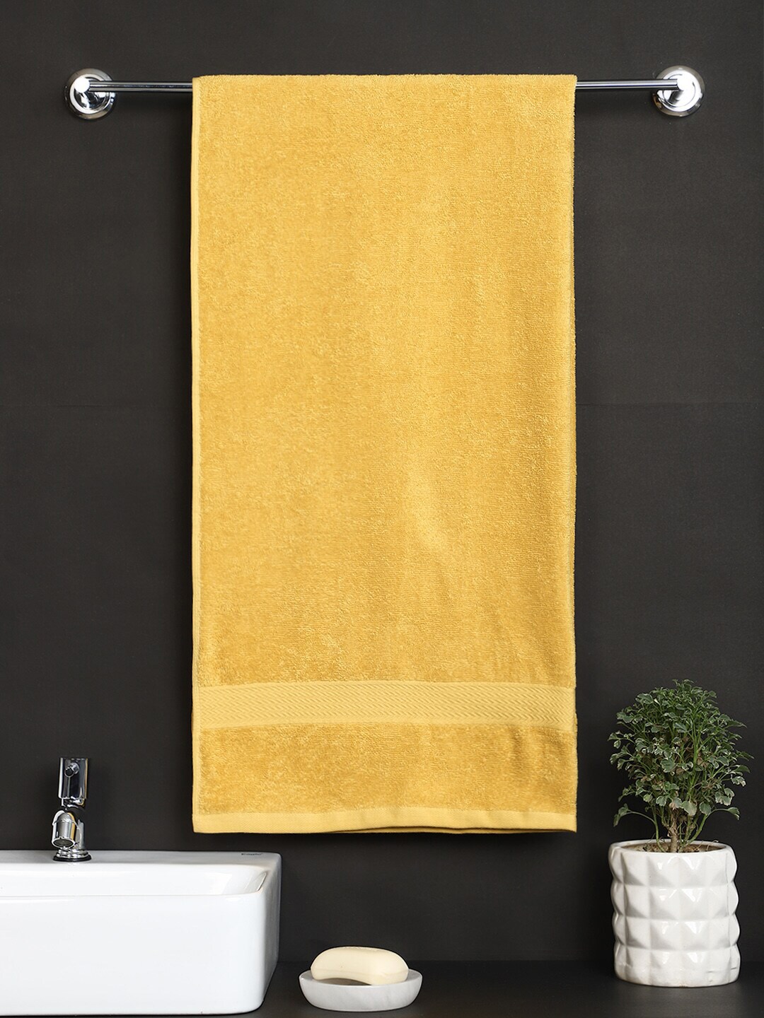 Raymond Home Yellow Solid Cotton 380 GSM Bath Towel Price in India