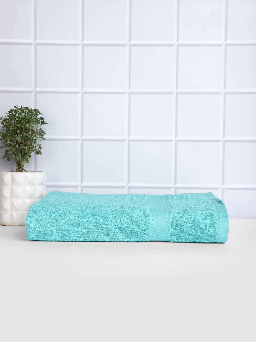 Raymond Home Turquoise Blue Solid 380 GSM Pure Cotton Bath Towel Price in India