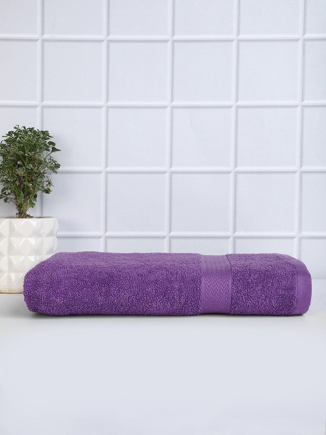 Raymond Home Purple Solid Cotton 380 Gsm Bath Towel Price in India