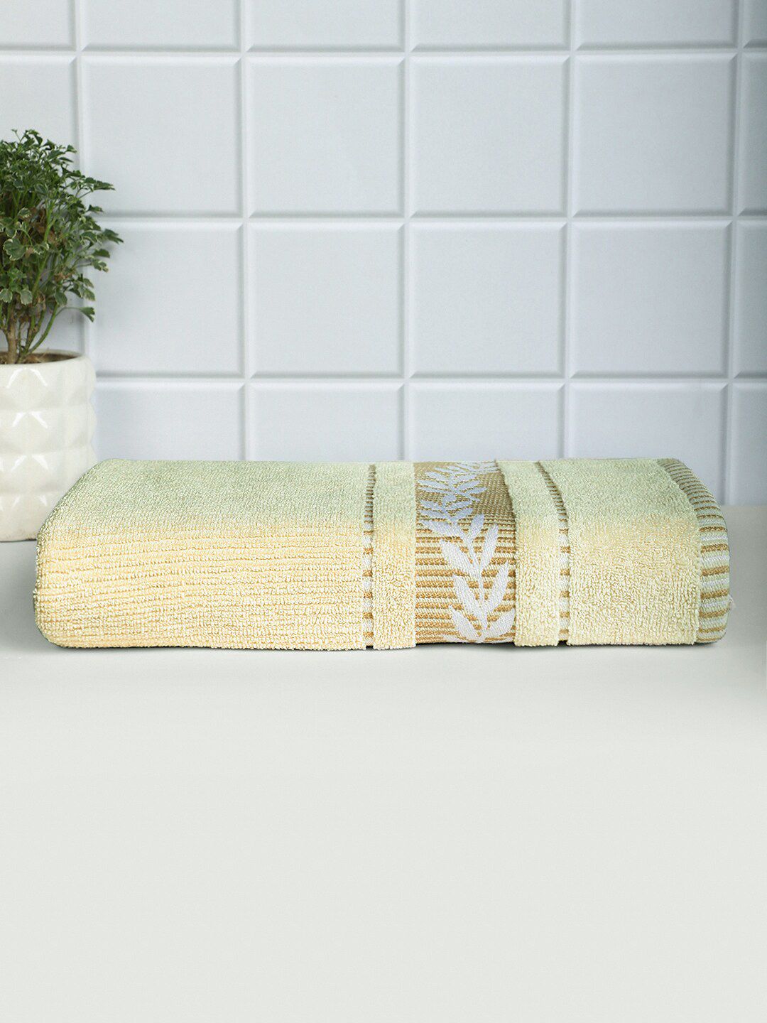 Raymond Home  Beige Solid 600 GSM Pure Cotton Bath Towels Price in India