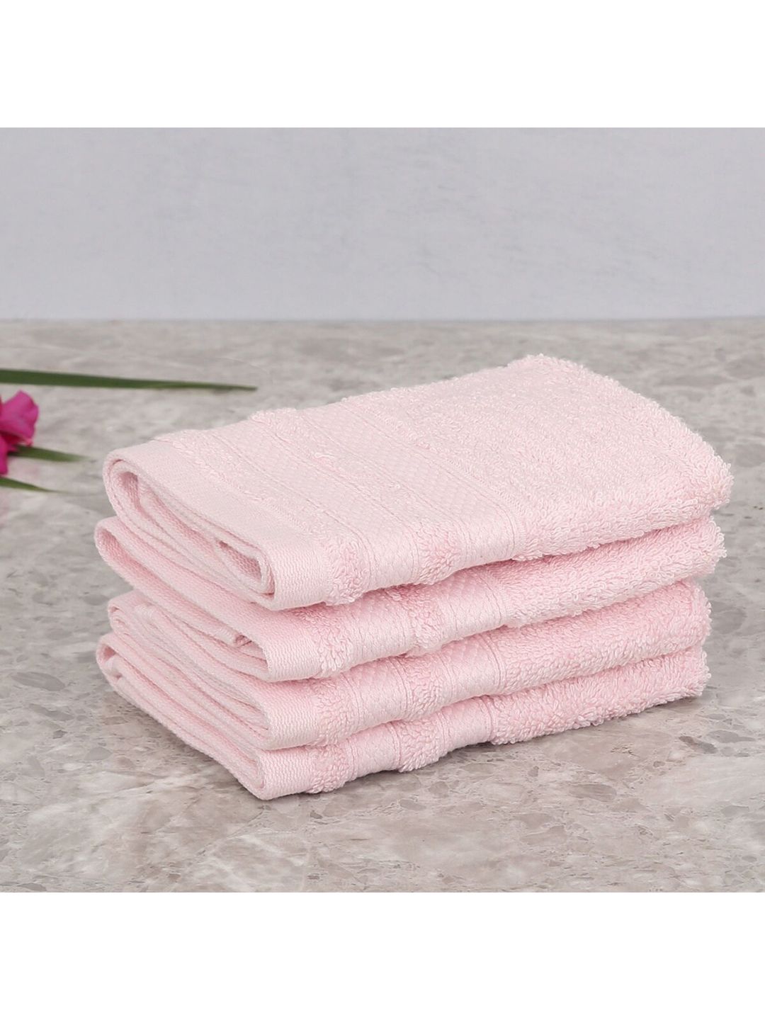Home Centre Unisex Pack Of 4 Pink Solid 500 GSM Cotton Face Towels Price in India