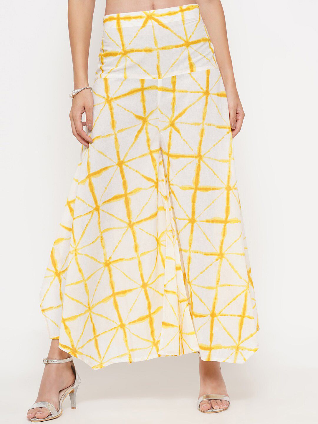 FABNEST Women Yellow & White Tie and Dye Cotton Flared Ethnic Palazzos Price in India