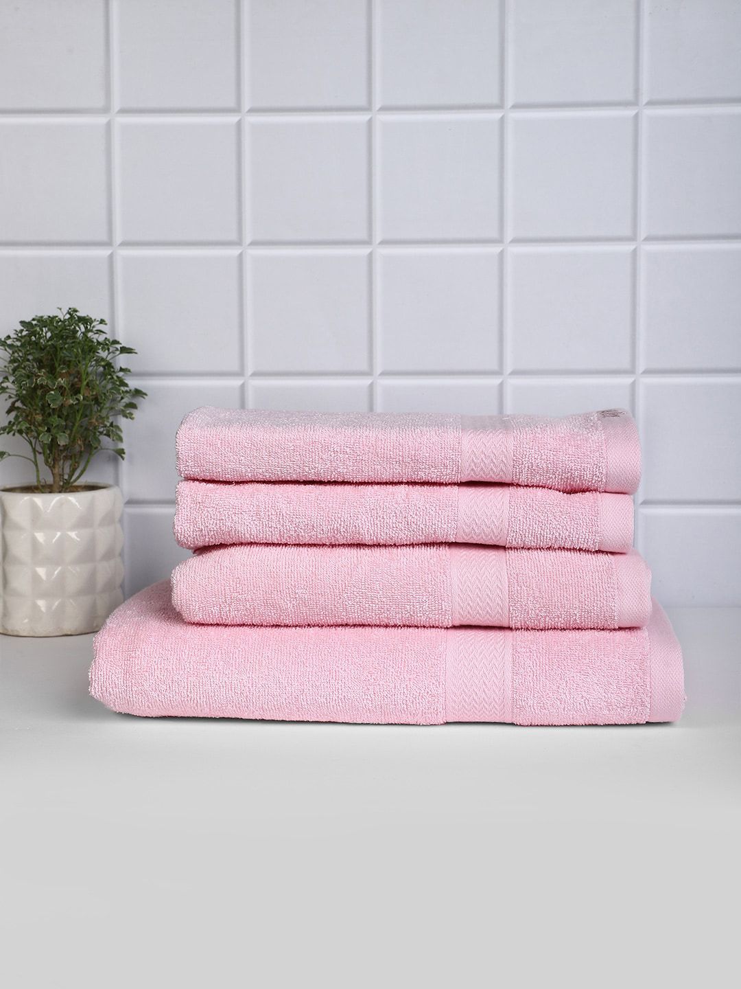 Raymond Home Set Of 4 Pink Solid Cotton 380 GSM Towel Set Price in India