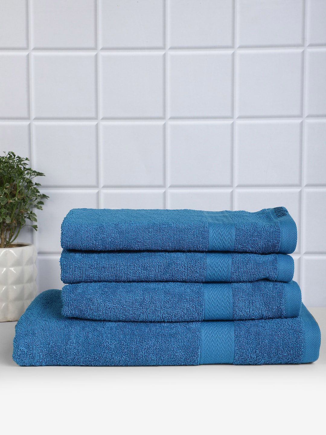 Raymond Home Set Of 4 Blue Solid 380 GSM Pure Cotton Towel Set Price in India